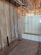 Bathroom featuring shower / washtub combination