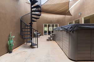 Stairway to rooftop patio