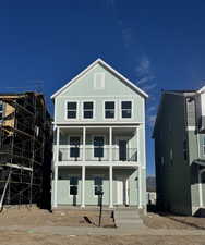 View of front of property featuring covered porch