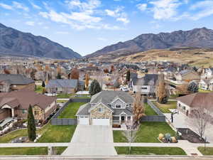 Aerial perspective of suburban area featuring mountains