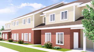 View of front facade featuring brick siding, roof with shingles, and a front lawn