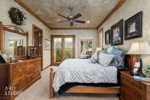 Bedroom featuring access to outside, ornamental molding, light carpet, a ceiling fan, and wallpapered walls