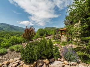 View of yard featuring a mountain view, a pergola, and a patio area