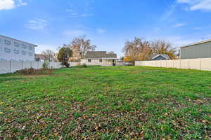 View of fenced backyard