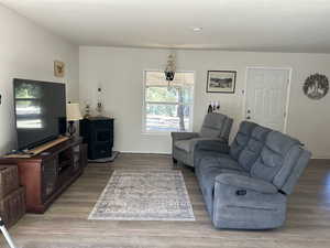 Living area with light wood-type flooring