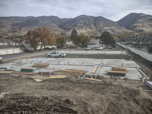 Surrounding community featuring a residential view and a mountain view