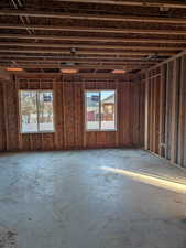 Miscellaneous room featuring healthy amount of natural light and a garage