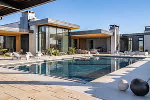 Outdoor pool with a patio area