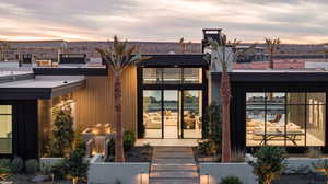 View of exterior entry at dusk