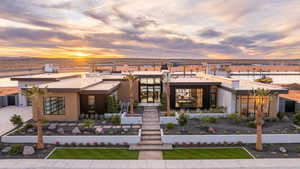 View of property featuring stairs