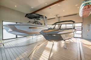 Dining space featuring beamed ceiling, hardwood / wood-style floors, and recessed lighting