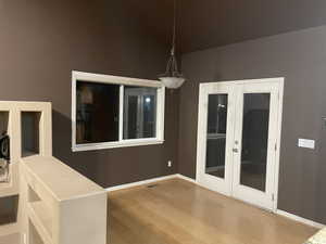 Unfurnished dining area with wood finished floors