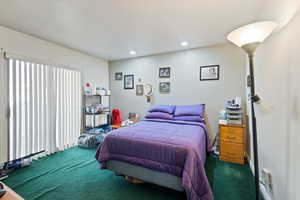 Bedroom featuring carpet and recessed lighting