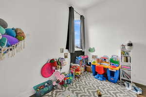 Playroom featuring baseboards