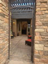 View of patio with a pergola