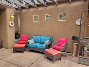 View of patio with outdoor lounge area