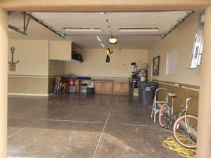 Garage featuring water heater