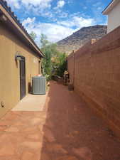 View of patio with a mountain view