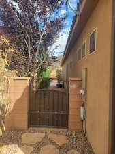 View of home's exterior with a gate