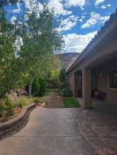 View of yard featuring a patio area and a mountain view