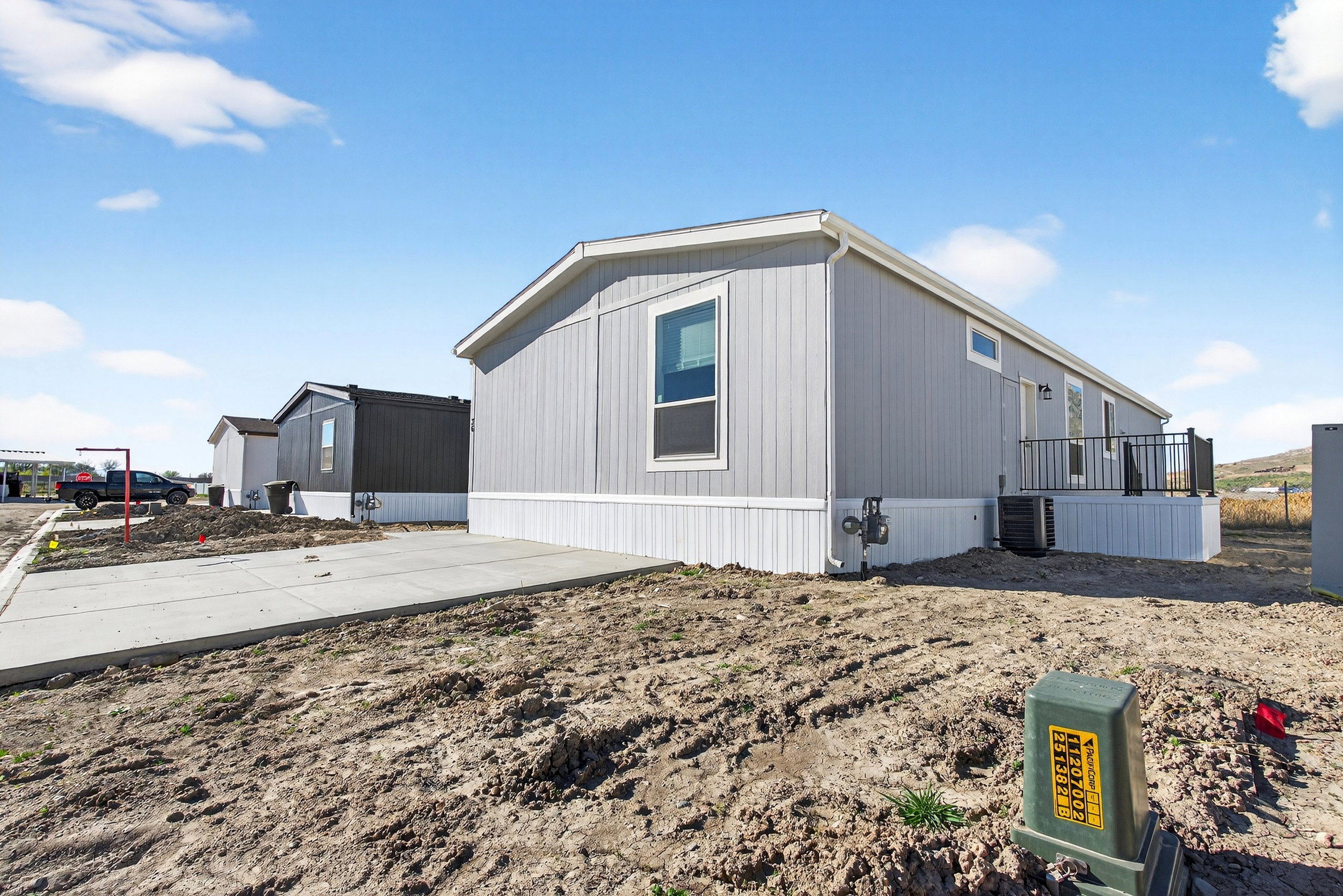 View of side of property featuring a central air condition unit