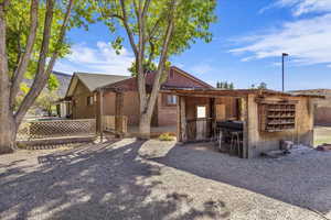 Back of property with brick siding
