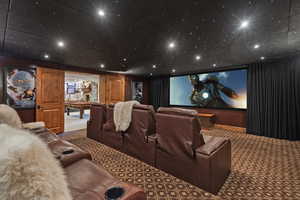 Home theater featuring billiards and carpet flooring