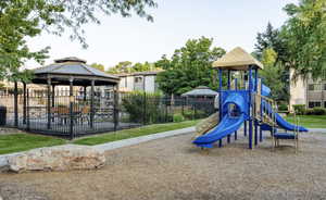 Communal playground with a gazebo and a patio area