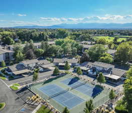 Aerial view of residential area featuring mountains