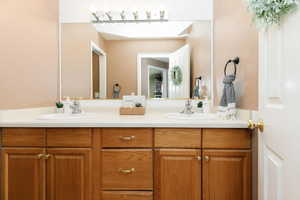 Bathroom featuring double vanity