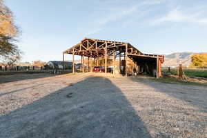 View of outbuilding featuring a mountain view and a view of rural / pastoral area