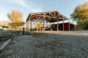 View of outdoor structure with a mountain view and a detached carport