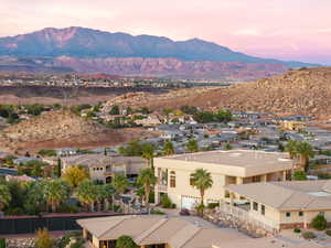 View of mountain backdrop with nearby suburban area