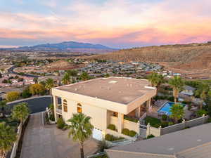 Aerial view at dusk of a mountain view and a residential view