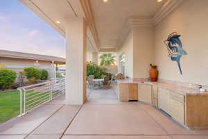View of patio / terrace featuring exterior kitchen and outdoor dining space