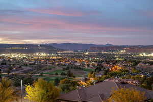 Aerial view at dusk of a mountain view and a residential view