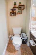 Bathroom with vanity and light tile patterned floors