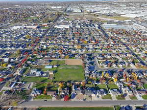 Aerial overview of property's location with nearby suburban area
