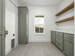 Laundry room with electric dryer hookup and hookup for a washing machine