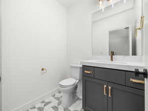 Bathroom featuring vanity and light tile patterned floors