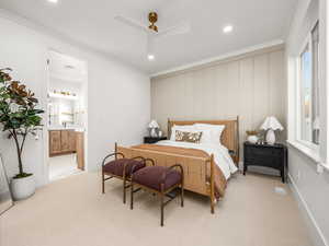 Bedroom with carpet floors, ornamental molding, a ceiling fan, and recessed lighting