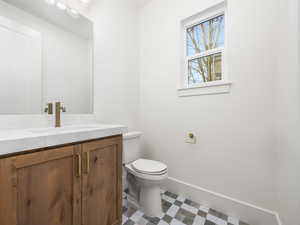 Bathroom with vanity and toilet