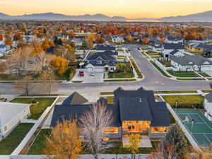 Aerial view at dusk of a residential view and a mountain view