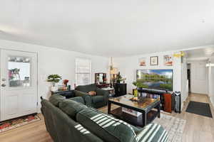Living area featuring light wood-style flooring