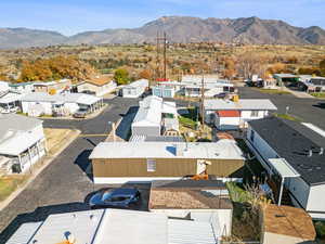 Aerial perspective of suburban area with mountains