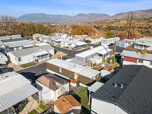 Aerial view of residential area with a mountain backdrop