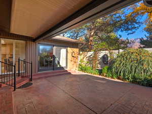 Fenced backyard featuring a patio