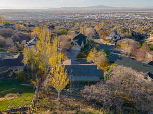 Aerial perspective of suburban area with a mountain backdrop