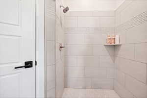 Full bathroom featuring a stall shower