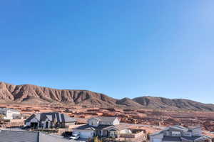 Mountain view featuring nearby suburban area